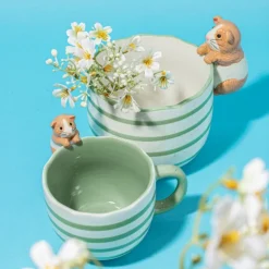 Mug peeking Guinea Pig